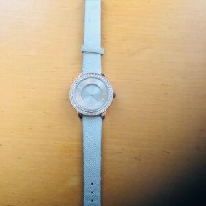 Elegant Watch with Light Blue Strap